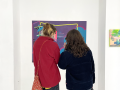 Eva-ten-Have-together-with-Tianna-Therriault-looking-at-a-painting-of-Marlet-Heckhoff-at-Gallery-Potemka-Leipzig